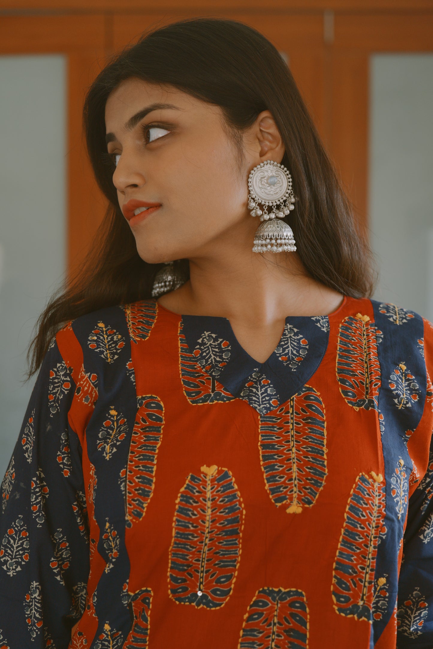 White metal finish light jhumkas with ghungroo