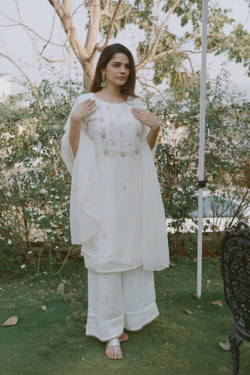 Ivory silk kurta with embroidered yoke, pants and scalloped dupatta